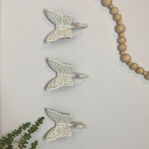 3 white distressed butterfly hooks